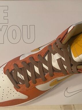 Nike Dunk Low orange brown white sneaker with yellow accents